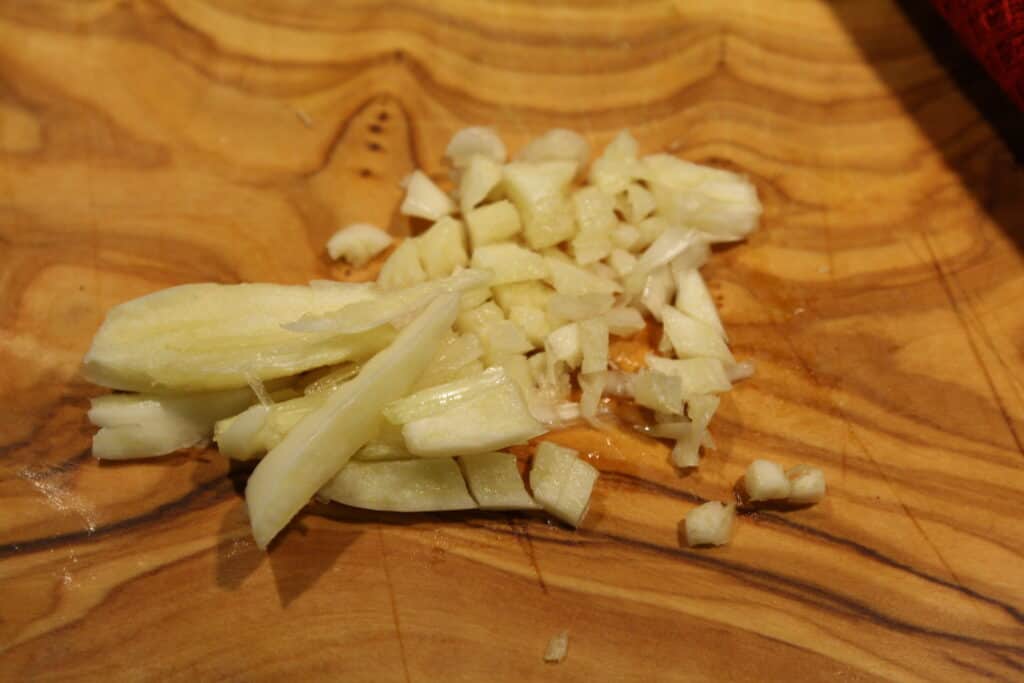 Slice garlic thinly in one direction