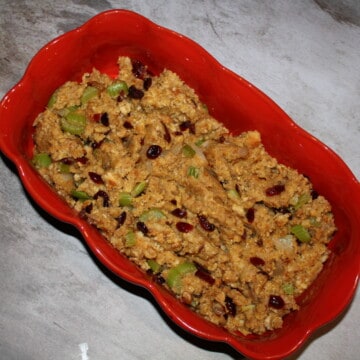 Easy Waldorf Cornbread Stuffing in a red dish