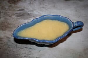 gravy in a blue saucer
