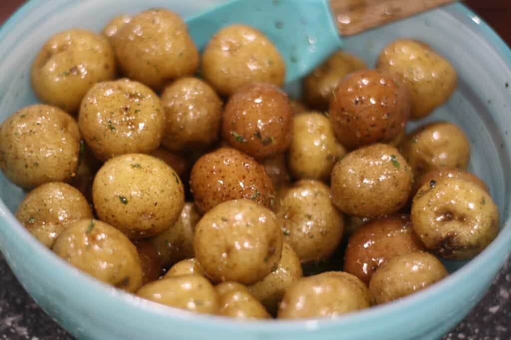 Tossed baby Potatoes in olive oil and herbs.