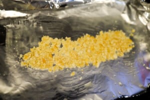 Ritz Cracker bread crumbs on aluminum foil
