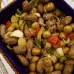 Oven Sausage Onion and Pepper recipe i a casserole pan