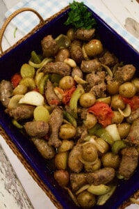 Oven Sausage Onion and Pepper recipe i a casserole pan