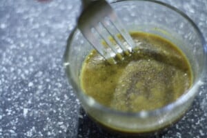 Stirring together seasoning for sausage casserole