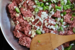 How to make Sloppy Joes. Ground beef, onion and pepper browning in a skillet.