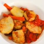 potatoes and carrots recipe pan fried in a white bowl
