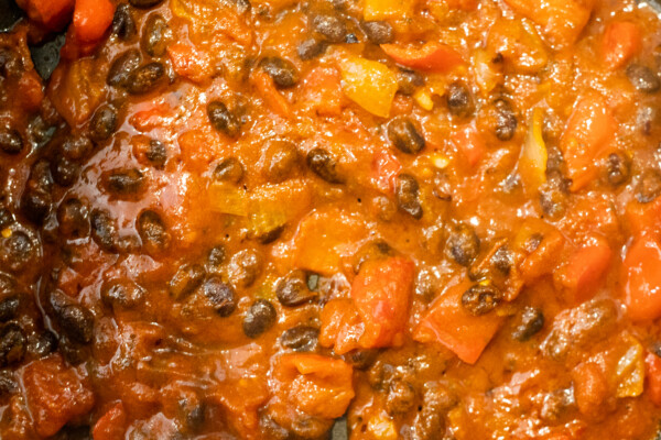 easy Spanish Rice sauce simmering in a skillet