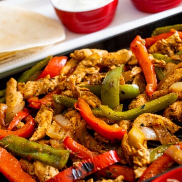 healthy chicken fajitas with all the fixings off to the side!